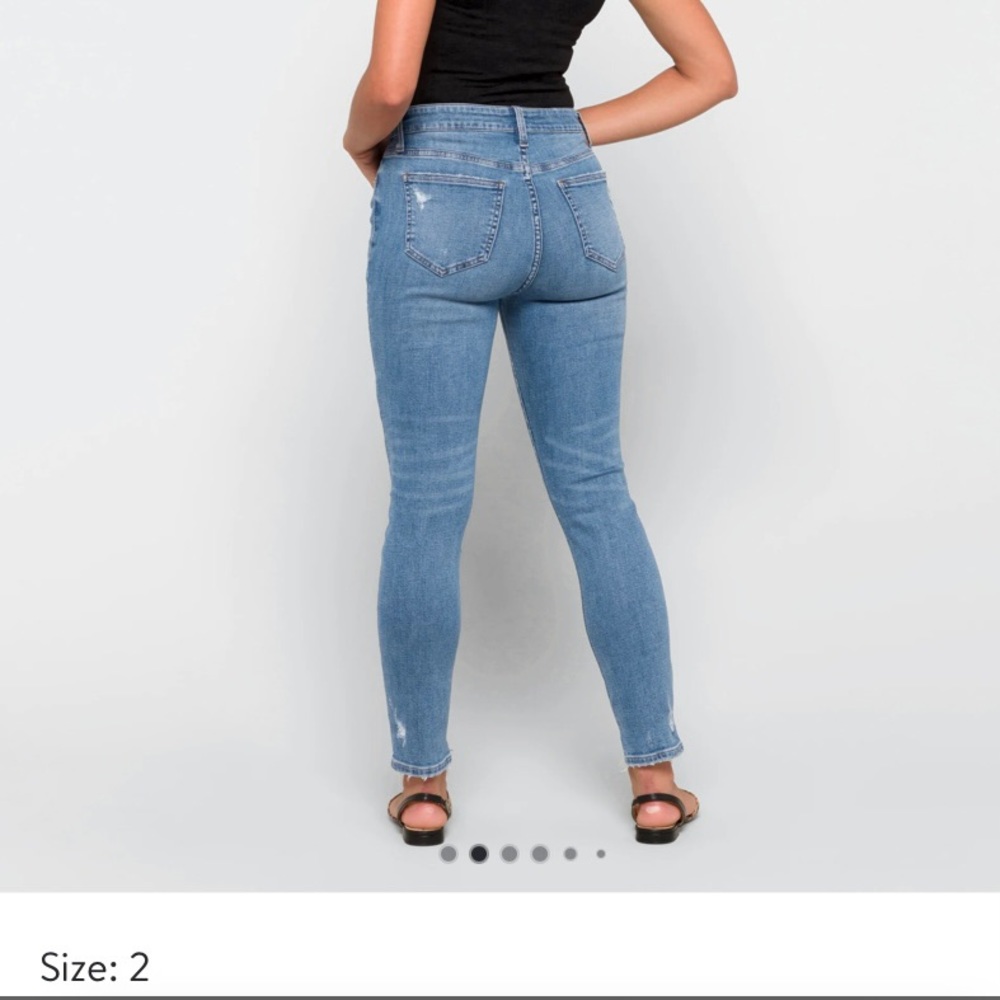 Distressed high rise skinny jeans